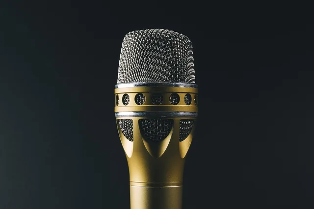audio, classic, gold, metal, mic, microphone, sound recording, blue microphone, blue metal, mic, mic, mic, mic, mic, microphone, microphone, microphone. Direct host-read deals or network buys for podcast advertising channel strategy