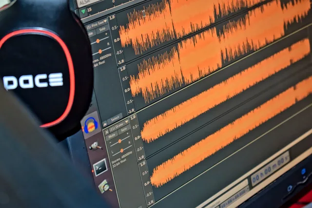 headphones, waveform, audio, desktop, monitor, waveform, waveform, waveform, waveform, waveform. Nine steps to podcast advertising measurement and reporting