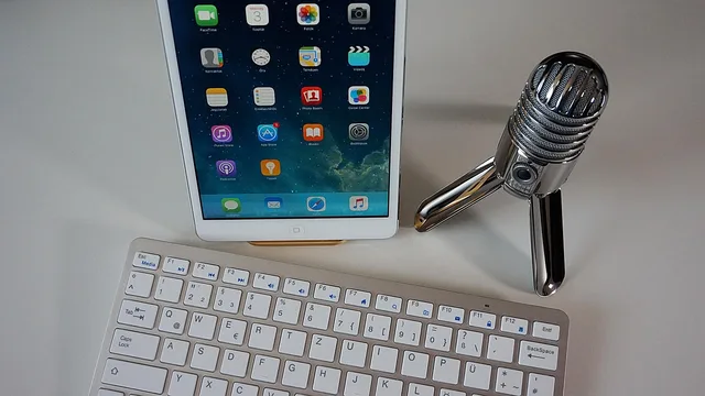 microphone, keyboard, tablet, podcast, condenser microphone, home office, podcast, podcast, podcast, podcast, podcast. Podcast network advertising vs direct: which is better in the UK?
